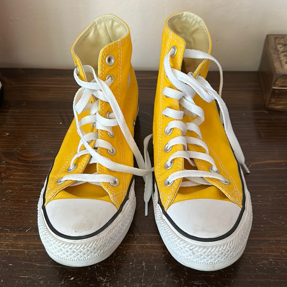 Yellow high top converse